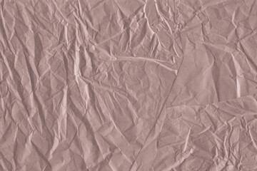 Classic vintage and old looking crumpled paper background. Retro cardboard texture. Grunge paper for drawing. Ancient book page. Present wrapping.