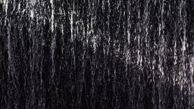 Mosaic cube stone wall with waterfall and dynamic of light.