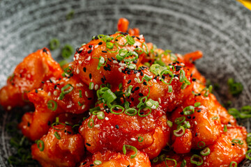 Deep fried asian chicken with sesame green onion
