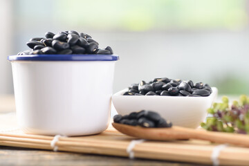 Close up of organic black beans in healthy food concept	
