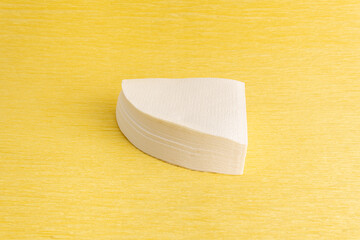 Coffee Filters on yellow background