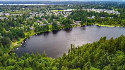 Forest lake near the town, view from above. View from Echo Peak Loop Trail, Renton Washington, USA