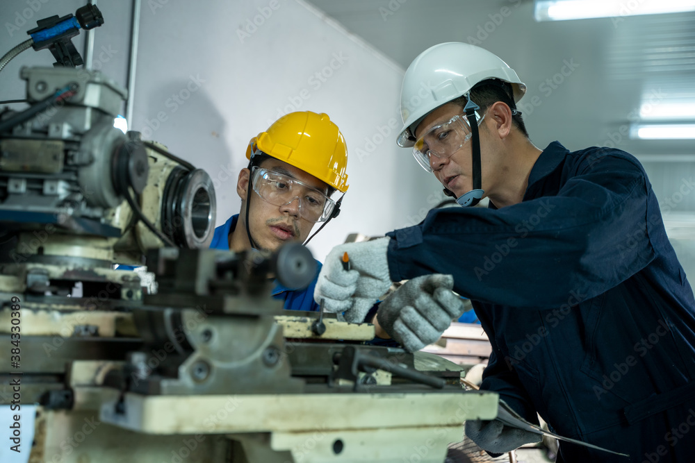 Poster Engineer and factory worker are working on projects at machine for steel structure industry.
