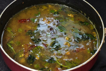 South Indian Rasam,Tamarind juice cooked with spices and tomato