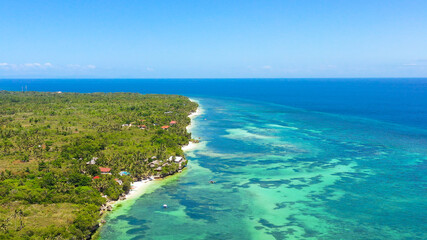 Fototapeta na wymiar Aerial drone of coast, turquoise sea and sand beach. Bohol, Anda, Philippines.