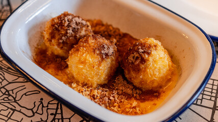 The famous Hungarian dessert called túrógombóc, curd cheese dumplings.