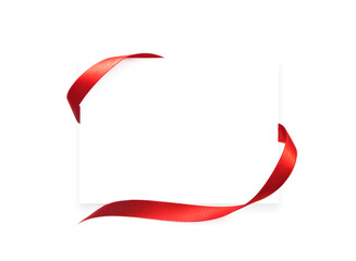 Obraz premium White paper with red ribbon frame with copyspace.