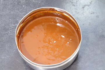 Hair pack henna isolated on black background