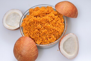 Close up view of dried coconut chips chutney on white background in india