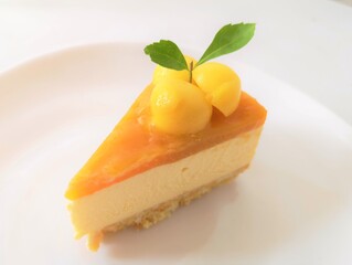 Mango cheesecake top with fresh mango.
