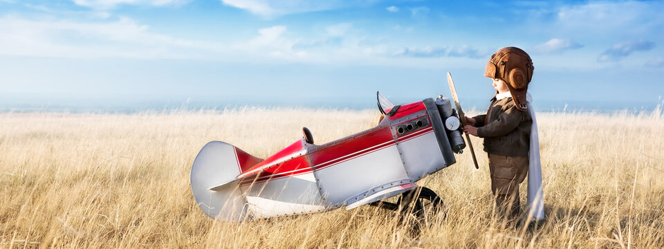 Young Aviator With Airplane Model