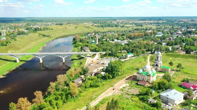 Aerial view of the Staritsa town and the road bridge over the Volga rivers