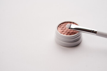 professional eyeshadow on isolated background and makeup brushes cosmetics fashion