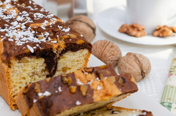 Homemade sponge cake with nuts and coffee
