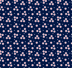 Floral pattern. Pretty flowers on dark blue background. Printing with small white flowers. Ditsy print. Seamless vector texture. Spring bouquet.