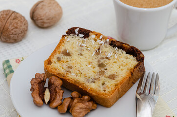 Fototapeta na wymiar Homemade sponge cake with nuts and coffee