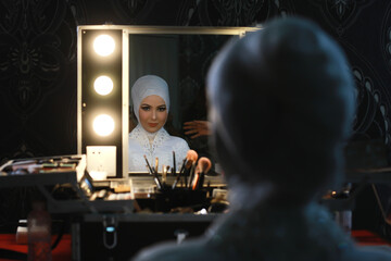 Blurred photo of bride in make-up room on wedding day