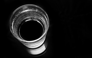 Glass of water isolated on black background