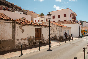 Fototapeta na wymiar Destroyed houses on an old street in San Sebastian, La Gomera, Canary islands