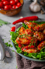 Delicious hot wings with chilli and garlic