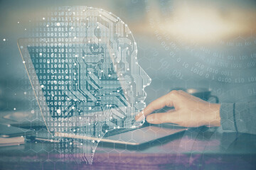 Man typing on keyboard background with brain hologram. Concept of big Data. Double exposure.