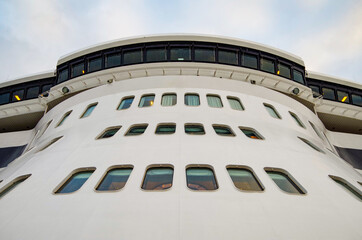 Famous Cunard oceanliner, cruiseship or cruise ship liner QM2 Queen Mary 2 in port on grey, rainy...