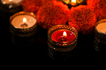 Indian Festival Diwali , oil lamp and flower design on dark background