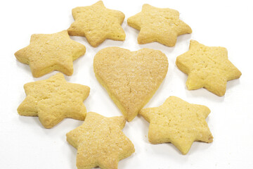 baked butter cookies form stars and hearts