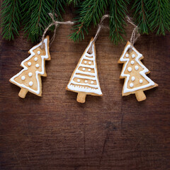 Christmas background with cookies on the wooden brown background