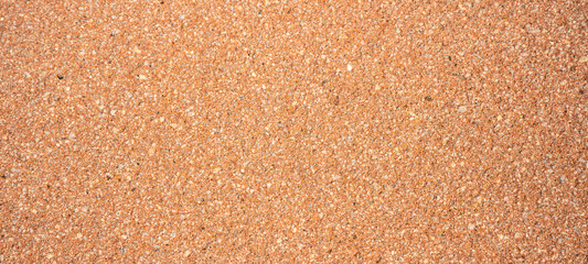 Brown orange terra-cotta mediterranean spotted paving stone / terrace covering texture background banner