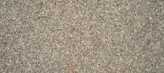 Grey gray anthracite spotted concrete asphalt / paving stone / terrace covering texture background banner