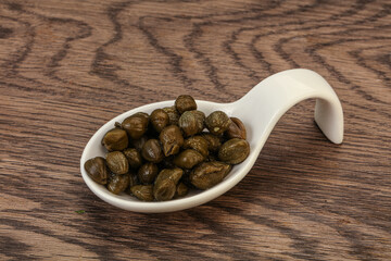 Tasty capers in the bowl