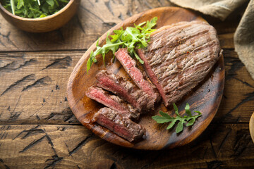 Grilled beef steak with arugula salad