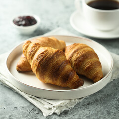 Traditional homemade French croissants on a plate