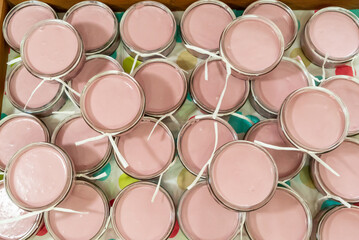 Red wine cream in dessert glasses from above with a ribbon around it