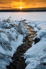 Fototapeta premium Winter sunset on the river