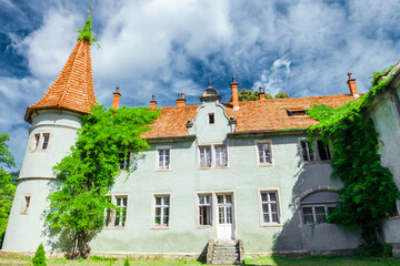 Antique Shenborn palace by blue sky in western Ukraine