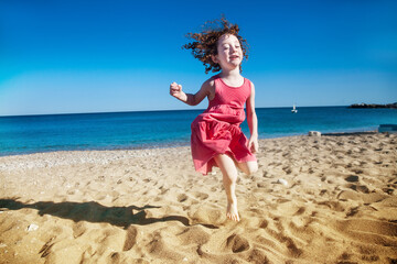 Cute little girl happy at seaside