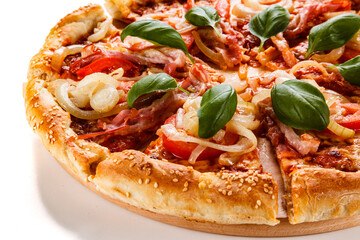 Pizza with ham, mozzarella, champignon, tomatoes and onion on white background
