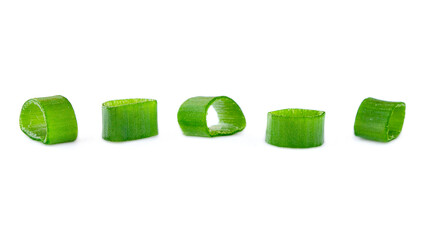 Heap of chopped spring onions isolated on white background. Sliced green onions on a white...