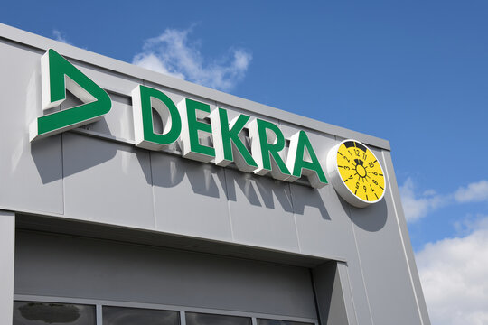 Salzkotten, North Rhine-Westphalia / Germany - May 12, 2019:  Logo of DEKRA in Salzkotten, Germany - Dekra is a European vehicle inspection company