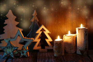 Christmas card with candles, stars and wooden trees, copy space