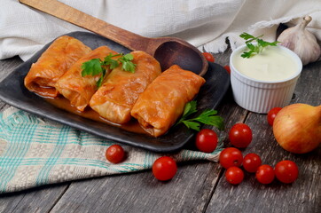 Cabbage rolls stuffed with ground meat and rice. Delicious homemade stuffed cabbage leaves with meat, rice and spices
