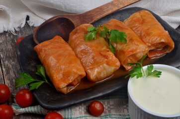 Cabbage rolls stuffed with ground meat and rice. Delicious homemade stuffed cabbage leaves with meat, rice and spices