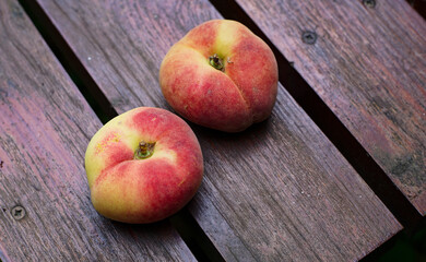 Peaches on the wood table