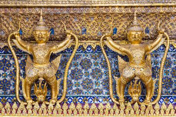 Fototapeta na wymiar Golden statue of Garuda (a mythical half man and bird) at Wat Phra Kaew, Bangkok< thailand.