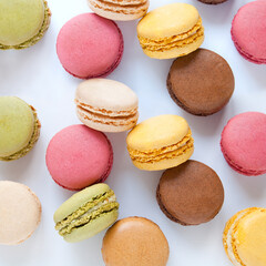 Colorful French Macarons on the white background