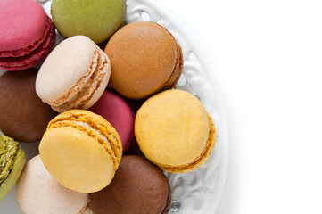 Colorful French Macarons on the white background