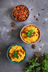 Pumpkin porridge with rice and raisins. Tasty healthy diet breakfast. Proper nutrition