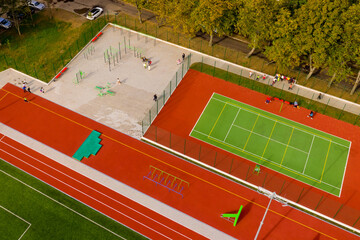 Aerial view of public city tennis court.